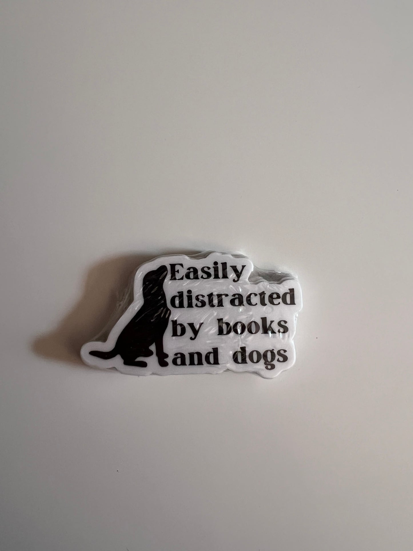 Easily distracted by books and dogs