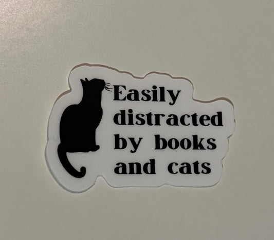 Easily distracted by books and cats